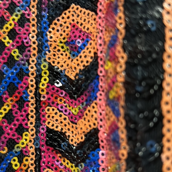 Top with different sequins colors. Finished with leather bias . - Picture 3 of 6